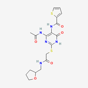 molecular formula C18H21N5O5S2 B2724507 N-(4-acetamido-6-oxo-2-((2-oxo-2-(((tetrahydrofuran-2-yl)methyl)amino)ethyl)thio)-1,6-dihydropyrimidin-5-yl)thiophene-2-carboxamide CAS No. 872608-94-1