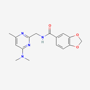 molecular formula C16H18N4O3 B2724620 N-{[4-(dimethylamino)-6-methylpyrimidin-2-yl]methyl}-2H-1,3-benzodioxole-5-carboxamide CAS No. 1797811-60-9