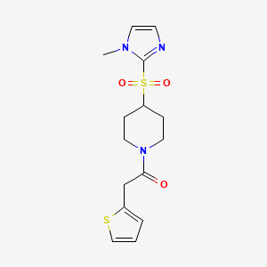 molecular formula C15H19N3O3S2 B2726779 1-{4-[(1-methyl-1H-imidazol-2-yl)sulfonyl]piperidin-1-yl}-2-(thiophen-2-yl)ethan-1-one CAS No. 2319809-76-0