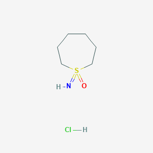molecular formula C6H14ClNOS B2728252 1-Imino-1l6-thiepane 1-oxide hydrochloride CAS No. 2241128-62-9