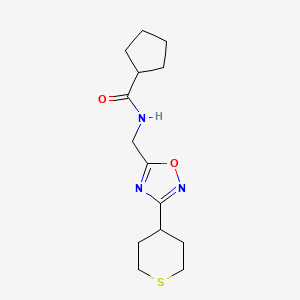molecular formula C14H21N3O2S B2732833 N-{[3-(thian-4-yl)-1,2,4-oxadiazol-5-yl]methyl}cyclopentanecarboxamide CAS No. 2034292-55-0