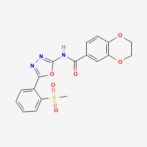 molecular formula C18H15N3O6S B2733308 N-[5-(2-methanesulfonylphenyl)-1,3,4-oxadiazol-2-yl]-2,3-dihydro-1,4-benzodioxine-6-carboxamide CAS No. 886923-86-0
