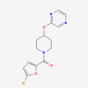 molecular formula C14H14BrN3O3 B2733878 (5-Bromofuran-2-yl)(4-(pyrazin-2-yloxy)piperidin-1-yl)methanone CAS No. 1421497-11-1