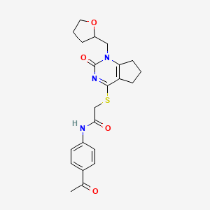 molecular formula C22H25N3O4S B2733941 N-(4-acetylphenyl)-2-((2-oxo-1-((tetrahydrofuran-2-yl)methyl)-2,5,6,7-tetrahydro-1H-cyclopenta[d]pyrimidin-4-yl)thio)acetamide CAS No. 899993-32-9