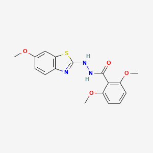 2,6-dimethoxy-N'-(6-methoxy-1,3-benzothiazol-2-yl)benzohydrazide