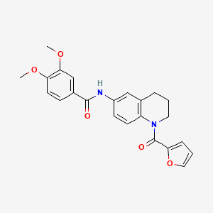 molecular formula C23H22N2O5 B2735641 N-[1-(furan-2-carbonyl)-1,2,3,4-tetrahydroquinolin-6-yl]-3,4-dimethoxybenzamide CAS No. 946317-94-8