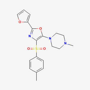 molecular formula C19H21N3O4S B2739785 1-[2-(Furan-2-yl)-4-(4-methylbenzenesulfonyl)-1,3-oxazol-5-yl]-4-methylpiperazine CAS No. 855714-88-4
