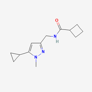 B2739938 N-((5-cyclopropyl-1-methyl-1H-pyrazol-3-yl)methyl)cyclobutanecarboxamide CAS No. 1448057-55-3