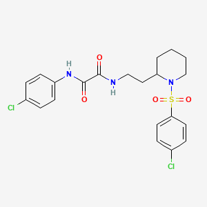 molecular formula C21H23Cl2N3O4S B2740077 N-{2-[1-(4-chlorobenzenesulfonyl)piperidin-2-yl]ethyl}-N'-(4-chlorophenyl)ethanediamide CAS No. 898406-48-9