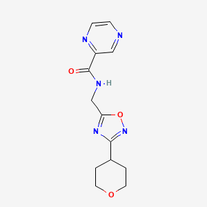 molecular formula C13H15N5O3 B2742001 N-{[3-(oxan-4-yl)-1,2,4-oxadiazol-5-yl]methyl}pyrazine-2-carboxamide CAS No. 2034562-06-4