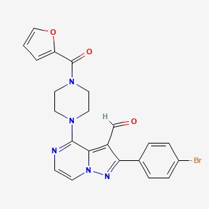 2-(4-Bromophenyl)-4-[4-(furan-2-carbonyl)piperazin-1-yl]pyrazolo[1,5-a]pyrazine-3-carbaldehyde