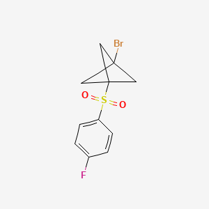 molecular formula C11H10BrFO2S B2743089 1-bromo-3-(4-fluorobenzenesulfonyl)bicyclo[1.1.1]pentane CAS No. 2411290-01-0