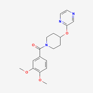 molecular formula C18H21N3O4 B2745804 (3,4-Dimethoxyphenyl)(4-(pyrazin-2-yloxy)piperidin-1-yl)methanone CAS No. 1421475-05-9