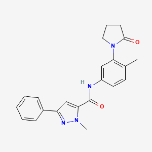 B2748729 1-methyl-N-(4-methyl-3-(2-oxopyrrolidin-1-yl)phenyl)-3-phenyl-1H-pyrazole-5-carboxamide CAS No. 1323713-99-0