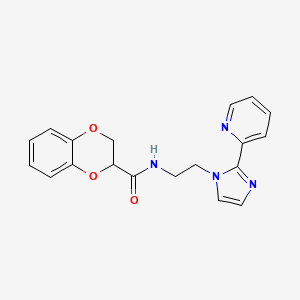 molecular formula C19H18N4O3 B2750607 N-{2-[2-(pyridin-2-yl)-1H-imidazol-1-yl]ethyl}-2,3-dihydro-1,4-benzodioxine-2-carboxamide CAS No. 2034287-54-0