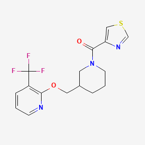 B2750831 1,3-Thiazol-4-yl-[3-[[3-(trifluoromethyl)pyridin-2-yl]oxymethyl]piperidin-1-yl]methanone CAS No. 2379984-80-0