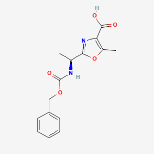 molecular formula C15H16N2O5 B2752671 2-[(1S)-1-{[(benzyloxy)carbonyl]amino}ethyl]-5-methyl-1,3-oxazole-4-carboxylic acid CAS No. 521096-39-9