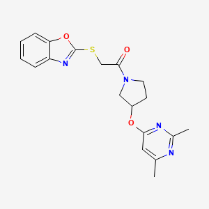 molecular formula C19H20N4O3S B2753398 2-(1,3-Benzoxazol-2-ylsulfanyl)-1-{3-[(2,6-dimethylpyrimidin-4-yl)oxy]pyrrolidin-1-yl}ethan-1-one CAS No. 2097915-52-9