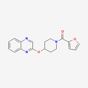 molecular formula C18H17N3O3 B2755470 2-{[1-(furan-2-carbonyl)piperidin-4-yl]oxy}quinoxaline CAS No. 1704986-91-3