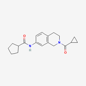 molecular formula C19H24N2O2 B2756347 N-(2-(cyclopropanecarbonyl)-1,2,3,4-tetrahydroisoquinolin-7-yl)cyclopentanecarboxamide CAS No. 955712-38-6