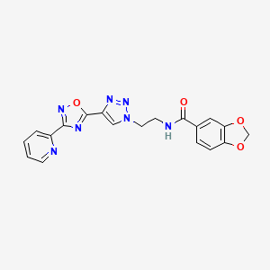 molecular formula C19H15N7O4 B2757659 N-(2-(4-(3-(pyridin-2-yl)-1,2,4-oxadiazol-5-yl)-1H-1,2,3-triazol-1-yl)ethyl)benzo[d][1,3]dioxole-5-carboxamide CAS No. 2034535-15-2