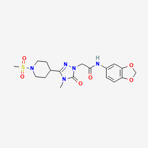 molecular formula C18H23N5O6S B2758031 N-(2H-1,3-benzodioxol-5-yl)-2-[3-(1-methanesulfonylpiperidin-4-yl)-4-methyl-5-oxo-4,5-dihydro-1H-1,2,4-triazol-1-yl]acetamide CAS No. 1105248-53-0