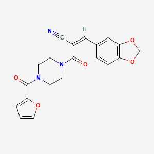 (Z)-3-(1,3-Benzodioxol-5-yl)-2-[4-(furan-2-carbonyl)piperazine-1-carbonyl]prop-2-enenitrile