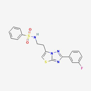 molecular formula C18H15FN4O2S2 B2758799 N-{2-[2-(3-fluorophenyl)-[1,2,4]triazolo[3,2-b][1,3]thiazol-6-yl]ethyl}benzenesulfonamide CAS No. 946206-63-9