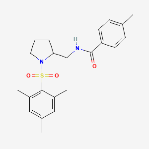 molecular formula C22H28N2O3S B2759498 N-((1-(mesitylsulfonyl)pyrrolidin-2-yl)methyl)-4-methylbenzamide CAS No. 896285-45-3