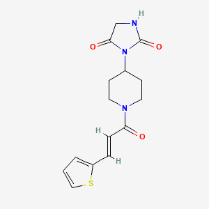 (E)-3-(1-(3-(thiophen-2-yl)acryloyl)piperidin-4-yl)imidazolidine-2,4-dione