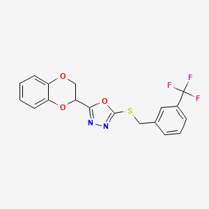 molecular formula C18H13F3N2O3S B2759920 2-(2,3-dihydro-1,4-benzodioxin-2-yl)-5-({[3-(trifluoromethyl)phenyl]methyl}sulfanyl)-1,3,4-oxadiazole CAS No. 1171537-47-5