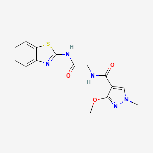 molecular formula C15H15N5O3S B2762162 N-(2-(benzo[d]thiazol-2-ylamino)-2-oxoethyl)-3-methoxy-1-methyl-1H-pyrazole-4-carboxamide CAS No. 1251579-07-3