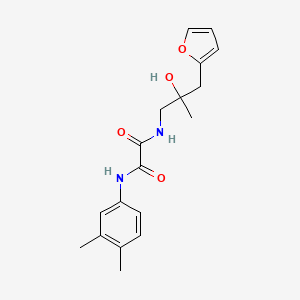 molecular formula C18H22N2O4 B2765327 N'-(3,4-dimethylphenyl)-N-{2-[(furan-2-yl)methyl]-2-hydroxypropyl}ethanediamide CAS No. 1795301-59-5