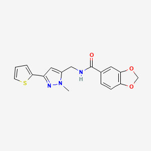 molecular formula C17H15N3O3S B2766038 N-{[1-methyl-3-(thiophen-2-yl)-1H-pyrazol-5-yl]methyl}-2H-1,3-benzodioxole-5-carboxamide CAS No. 2309747-68-8