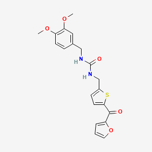 B2766128 1-(3,4-Dimethoxybenzyl)-3-((5-(furan-2-carbonyl)thiophen-2-yl)methyl)urea CAS No. 1797760-67-8