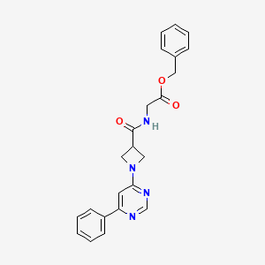 molecular formula C23H22N4O3 B2768708 Benzyl 2-(1-(6-phenylpyrimidin-4-yl)azetidine-3-carboxamido)acetate CAS No. 2034287-20-0