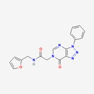 molecular formula C17H14N6O3 B2769814 N-[(furan-2-yl)methyl]-2-{7-oxo-3-phenyl-3H,6H,7H-[1,2,3]triazolo[4,5-d]pyrimidin-6-yl}acetamide CAS No. 863018-67-1