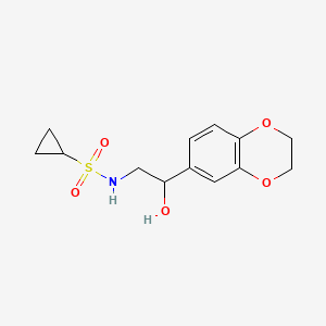 molecular formula C13H17NO5S B2769995 N-[2-(2,3-dihydro-1,4-benzodioxin-6-yl)-2-hydroxyethyl]cyclopropanesulfonamide CAS No. 2034418-39-6