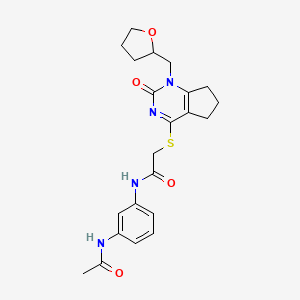 molecular formula C22H26N4O4S B2770345 N-(3-acetamidophenyl)-2-((2-oxo-1-((tetrahydrofuran-2-yl)methyl)-2,5,6,7-tetrahydro-1H-cyclopenta[d]pyrimidin-4-yl)thio)acetamide CAS No. 920389-03-3