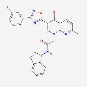 molecular formula C28H22FN5O3 B2770731 N-(2,3-dihydro-1H-inden-1-yl)-2-{3-[3-(3-fluorophenyl)-1,2,4-oxadiazol-5-yl]-7-methyl-4-oxo-1,4-dihydro-1,8-naphthyridin-1-yl}acetamide CAS No. 1032001-84-5