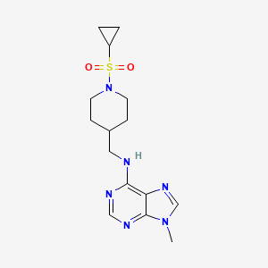 molecular formula C15H22N6O2S B2771018 N-{[1-(cyclopropanesulfonyl)piperidin-4-yl]methyl}-9-methyl-9H-purin-6-amine CAS No. 2380083-52-1