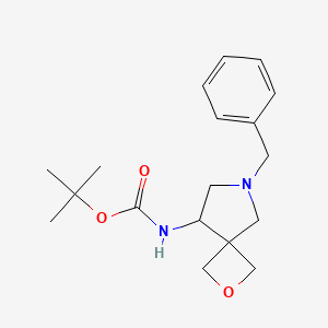 molecular formula C18H26N2O3 B2773155 tert-Butyl (6-benzyl-2-oxa-6-azaspiro[3.4]octan-8-yl)carbamate CAS No. 1422496-62-5