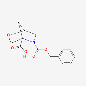 5-Phenylmethoxycarbonyl-2-oxa-5-azabicyclo[2.2.1]heptane-4-carboxylic acid