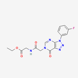 molecular formula C16H15FN6O4 B2774550 ethyl 2-{2-[3-(3-fluorophenyl)-7-oxo-3H,6H,7H-[1,2,3]triazolo[4,5-d]pyrimidin-6-yl]acetamido}acetate CAS No. 887223-10-1