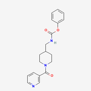 molecular formula C19H21N3O3 B2775641 Phenyl ((1-nicotinoylpiperidin-4-yl)methyl)carbamate CAS No. 1396582-37-8