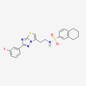 molecular formula C22H21FN4O2S2 B2777219 N-{2-[2-(3-fluorophenyl)-[1,2,4]triazolo[3,2-b][1,3]thiazol-6-yl]ethyl}-5,6,7,8-tetrahydronaphthalene-2-sulfonamide CAS No. 946274-65-3
