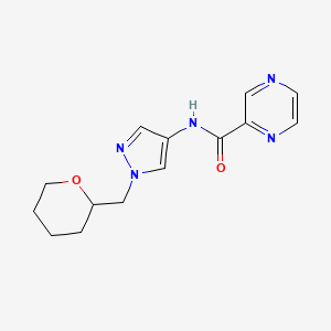 molecular formula C14H17N5O2 B2779632 N-{1-[(oxan-2-yl)methyl]-1H-pyrazol-4-yl}pyrazine-2-carboxamide CAS No. 2034228-62-9