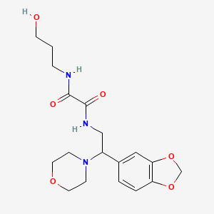 molecular formula C18H25N3O6 B2779913 N'-[2-(2H-1,3-benzodioxol-5-yl)-2-(morpholin-4-yl)ethyl]-N-(3-hydroxypropyl)ethanediamide CAS No. 896351-38-5