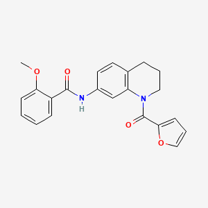 molecular formula C22H20N2O4 B2780331 N-[1-(furan-2-carbonyl)-1,2,3,4-tetrahydroquinolin-7-yl]-2-methoxybenzamide CAS No. 946243-96-5