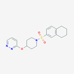 molecular formula C19H23N3O3S B2780619 3-((1-((5,6,7,8-Tetrahydronaphthalen-2-yl)sulfonyl)piperidin-4-yl)oxy)pyridazine CAS No. 1797862-31-7